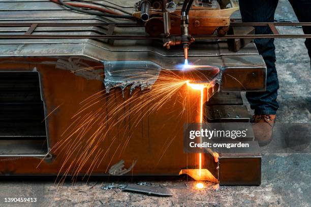 craftsman repairman is working with welding machine torch - blacksmith sparks stock pictures, royalty-free photos & images