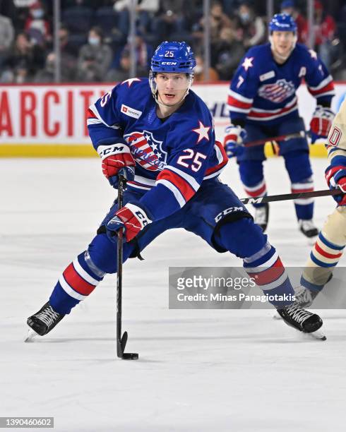 Arttu Ruotsalainen of the Rochester Americans skates the puck against the Laval Rocket during the third period at Place Bell on April 8, 2022 in...