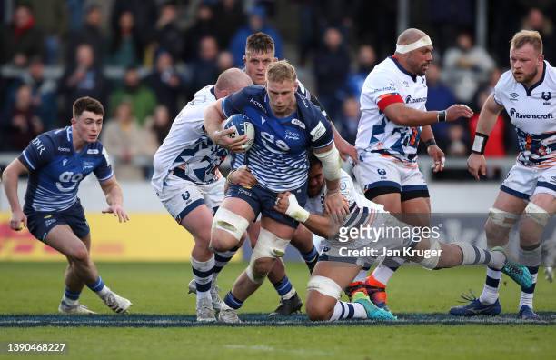 Jean-Luc du Preez of Sale Sharks breaks through the tackle of Steven Luatua of Bristol Bears during the Heineken Champions Cup Round of 16 Leg One...