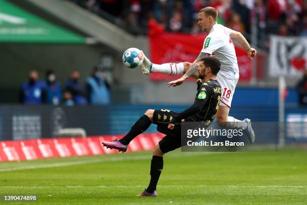 Aaron Martin of 1.FSV Mainz 05 battles for possession with Ondrej Duda of 1.FC Koeln during the Bundesliga match between 1. FC Koeln and 1. FSV Mainz...
