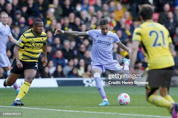 Raphinha of Leeds United scores their team's first goal during the Premier League match between Watford and Leeds United at Vicarage Road on April...