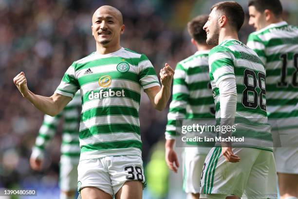 Daizen Maeda of Celtic celebrates after scoring the third goal during the Cinch Scottish Premiership match between Celtic FC and St. Johnstone FC at...