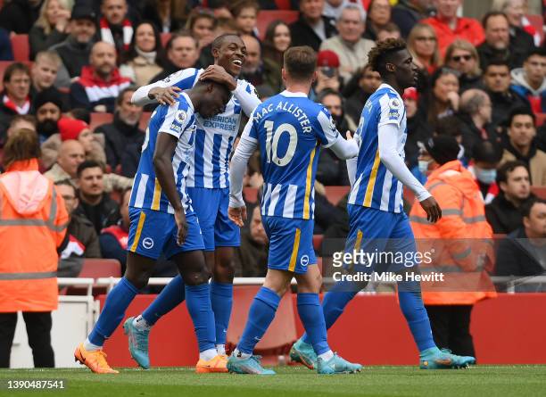 Enock Mwepu celebrates with teammate Moises Caicedo and Alexis Mac Allister of Brighton & Hove Albion after scoring their team's second goal during...