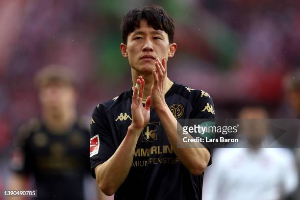 Lee Jae-sung of 1.FSV Mainz 05 looks dejected following their side's defeat in the Bundesliga match between 1. FC Koeln and 1. FSV Mainz 05 at...