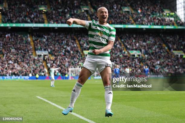 Daizen Maeda of Celtic celebrates after setting up Liel Abada who scored the seventh goal during the Cinch Scottish Premiership match between Celtic...