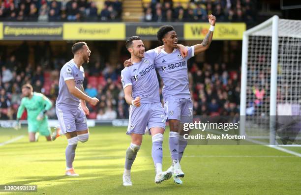 Jack Harrison celebrates with Crysencio Summerville of Leeds United after scoring their team's third goal during the Premier League match between...