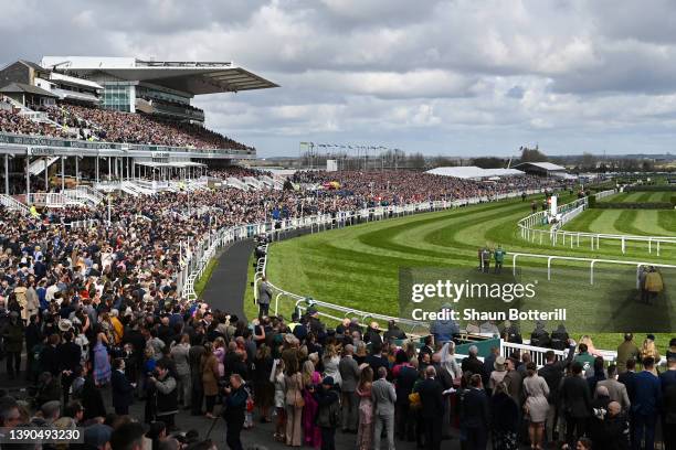 General view as racegoers watch runners in the EFT Construction Handicap Hurdle race during Aintree Races at Aintree Racecourse on April 09, 2022 in...