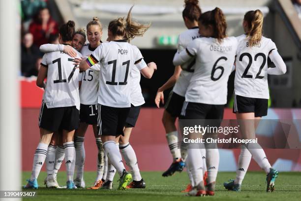 Felicitas Rauch of Germany celebrates the third goal with Svenja Huth and Giulia Gwinn during the FIFA Women's World Cup 2023 Qualifier group H match...