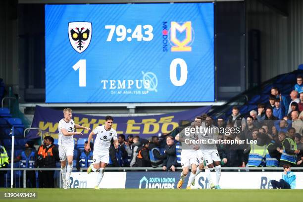 Troy Parrott of Milton Keynes Dons celebrates after scoring their side's first goal during the Sky Bet League One match between AFC Wimbledon and...