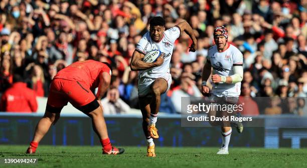 Robert Baloucoune of Ulster breaks clear to score their fourth and his third try during the Heineken Champions Cup match between Stade Toulousain and...