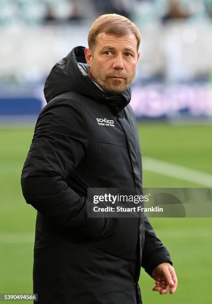 Frank Kramer, Head Coach of DSC Arminia Bielefeld acknowledges the fans after their sides defeat during the Bundesliga match between VfL Wolfsburg...