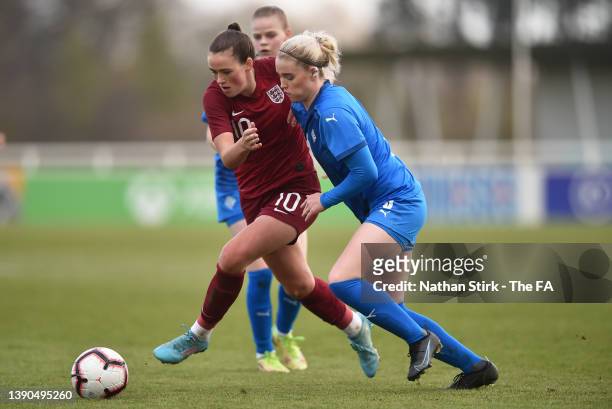 Grace Clinton of England U19 runs past Mikaela Petursdottir of Iceland during the UEFA European Women's Under-19 Championship Elite Round match...