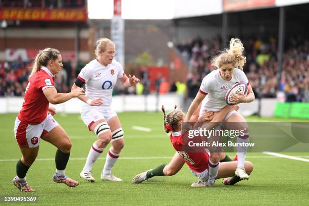 Abby Dow of England is injured as they are tackled by Hannah Jones of  News Photo - Getty Images