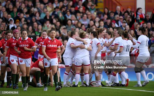 Lark Davies of England celebrates with teammates scoring their sides first try during the TikTok Women's Six Nations match between England and Wales...