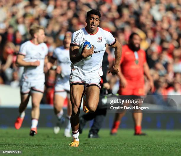 Robert Baloucoune of Ulster breaks clear to score their fourth and his third try during the Heineken Champions Cup match between Stade Toulousain and...