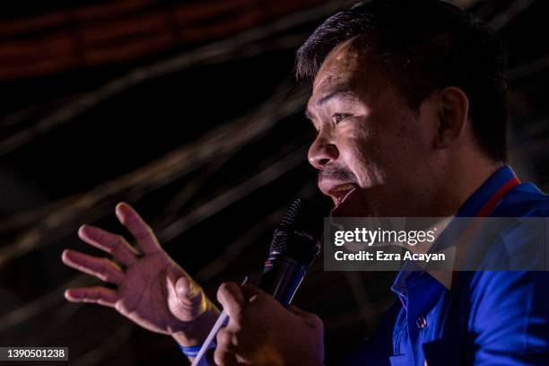 Senator and boxing icon Manny Pacquiao takes part in a rally in a slum area as he campaigns for the presidency on April 09, 2022 in Manila,...