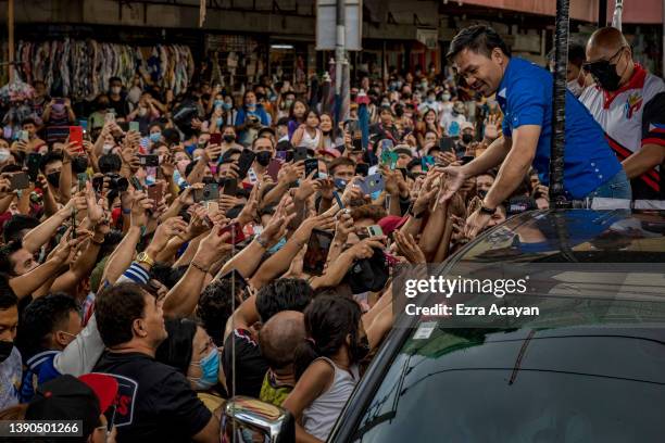 Senator and boxing icon Manny Pacquiao takes part in a motorcade as he campaigns for the presidency on April 09, 2022 in Manila, Philippines....