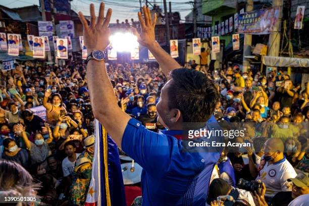 Senator and boxing icon Manny Pacquiao takes part in a rally in a slum area as he campaigns for the presidency on April 09, 2022 in Manila,...