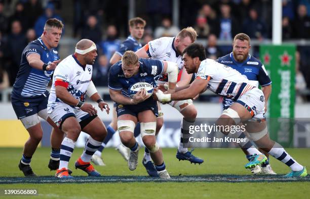 Jean-Luc du Preez of Sale Sharks breaks through the tackle of Steven Luatua of Bristol Bears during the Heineken Champions Cup Round of 16 Leg One...