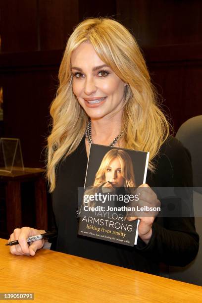 Taylor Armstrong signs copies of her memoir "Hiding from Reality: My Story Of Love, Loss, And Finding The Courage Within" at Barnes & Noble bookstore...