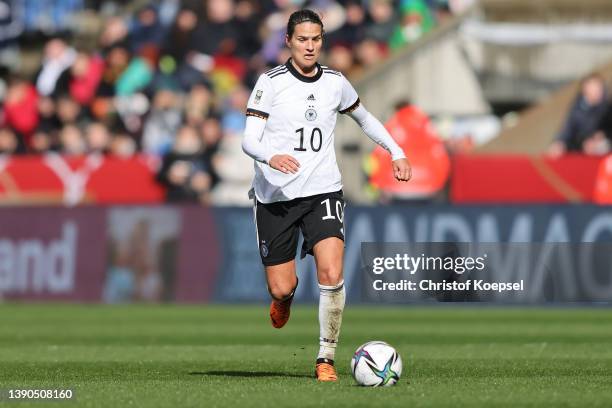 Dzsenifer Marozsan of Germany runs with the ball during the FIFA Women's World Cup 2023 Qualifier group H match between Germany and Portugal at...