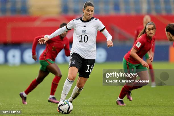 Dzsenifer Marozsan of Germany runs with the ball during the FIFA Women's World Cup 2023 Qualifier group H match between Germany and Portugal at...
