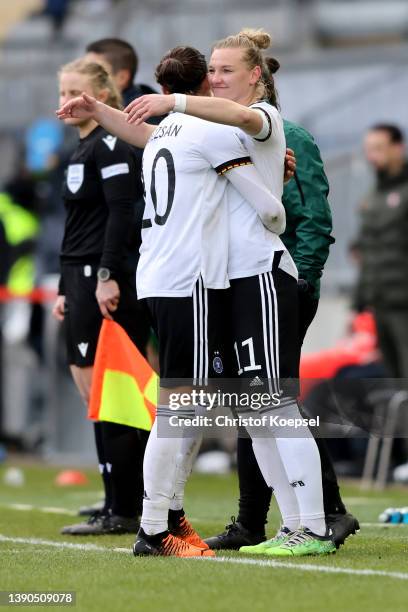 Dzsenifer Marozsan of Germany is substituted by Alexandra Popp of Germanyduring the FIFA Women's World Cup 2023 Qualifier group H match between...
