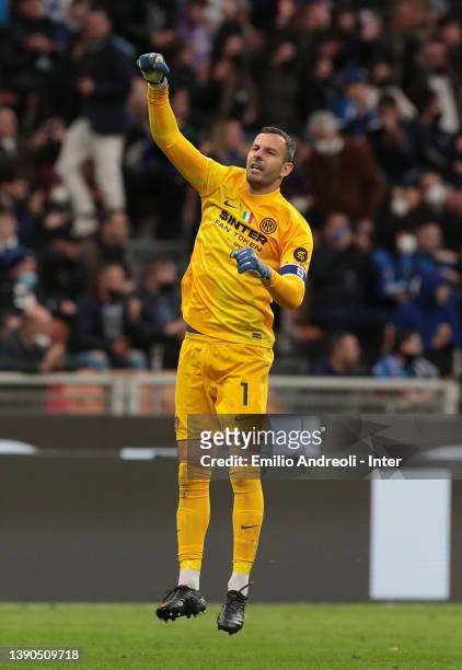 Samir Handanovic of FC Internazionale celebrates victory at the end of the Serie A match between FC Internazionale v Hellas Verona FC at Stadio...