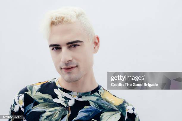 portrait of young man with blonde hair - platinum blonde hair stock pictures, royalty-free photos & images