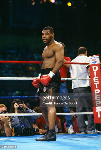 June 27: Heavyweight fighter Mike Tyson stands in his corner during a scheduled twelve round WBC, WBA, IBF heavyweight title fight against Michael...