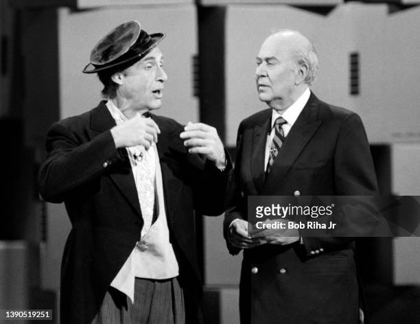 Comedy legends Sid Caesar and Carl Reiner perform during 'Comic Relief' fundraising concert, March 29, 1986 at Universal Amphitheater in Los Angeles,...