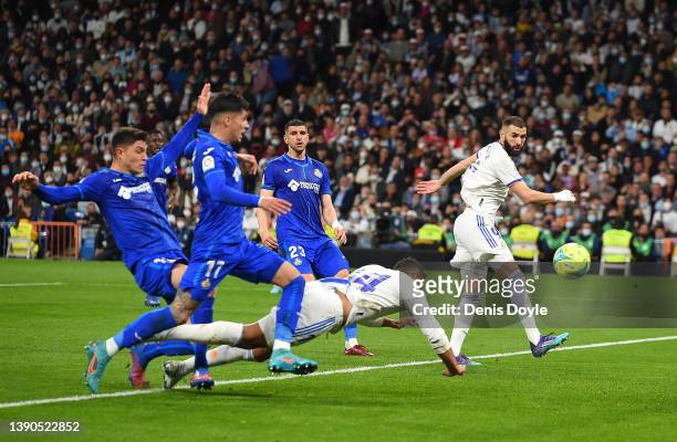 Casemiro of Real Madrid scores their side's first goal during the La Liga Santander match between Real Madrid CF and Getafe CF at Estadio Santiago...