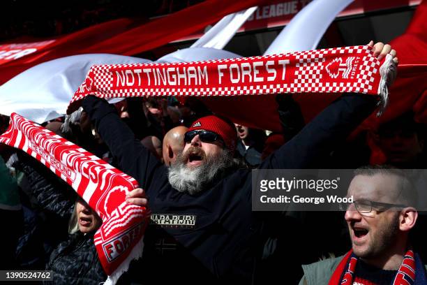 Nottingham Forest fans raise scarves as they show their support prior to the Sky Bet Championship match between Nottingham Forest and Birmingham City...