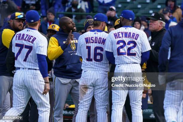 Milwaukee Brewers and Chicago Cubs players clear their benches after Andrew McCutchen of the Milwaukee Brewers was hit by a pitch during the eighth...