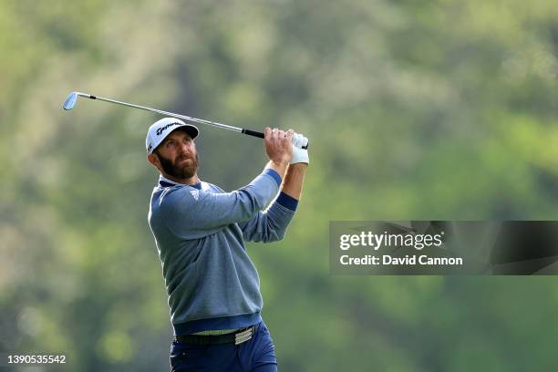 Dustin Johnson of the United States plays his second shot on the 14th hole during the third round of the Masters at Augusta National Golf Club on...