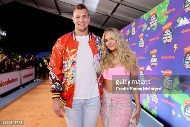 Rob Gronkowski and Camille Kostek attend the Nickelodeon's Kids' Choice Awards 2022 at Barker Hangar on April 09, 2022 in Santa Monica, California.