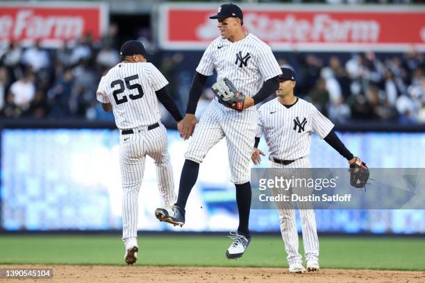 Aaron Judge and Gleyber Torres of the New York Yankees celebrate after defeating the Boston Red Sox in the game at Yankee Stadium on April 09, 2022...