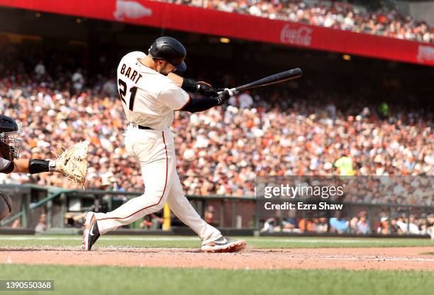 Joey Bart of the San Francisco Giants bats against the Miami Marlins during their opening day game at Oracle Park on April 08, 2022 in San Francisco,...