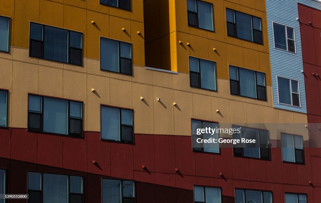 Condominium Reno Work The colorful exterior of a newly constructed condominium project in ...
