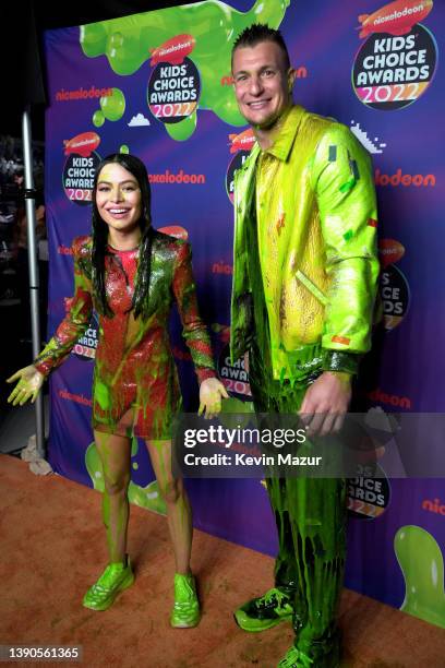 Miranda Cosgrove, and Rob Gronkowski pose backstage at the Nickelodeon's Kids' Choice Awards 2022 at Barker Hangar on April 09, 2022 in Santa Monica,...