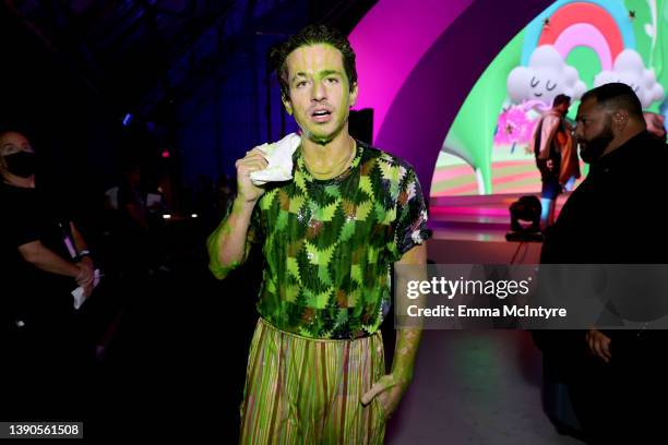 Charlie Puth is slimed onstage during the Nickelodeon's Kids' Choice Awards 2022 at Barker Hangar on April 09, 2022 in Santa Monica, California.