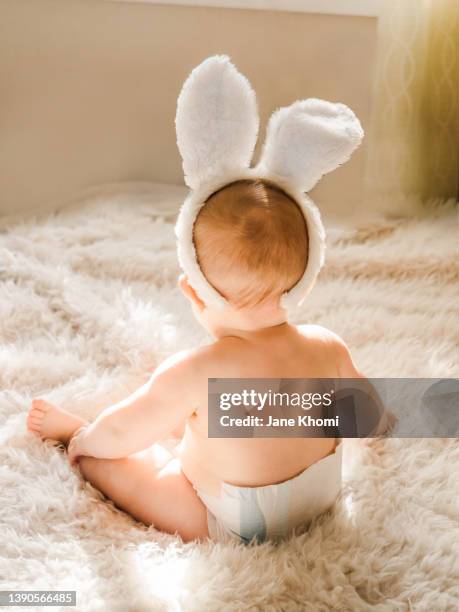 infant in bunny costume - costume rabbit ears stock pictures, royalty-free photos & images