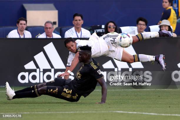 Jesús Murillo of Los Angeles FC defends against a pass by Javier Hernández of Los Angeles Galaxy during the second half of a game at Dignity Health...