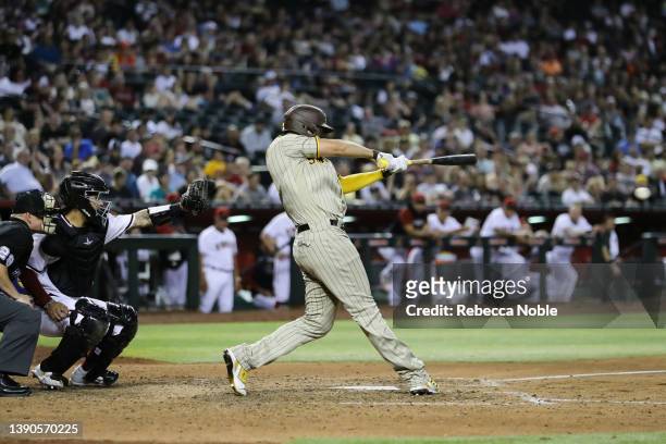 Infielder Eric Hosmer of the San Diego Padres gets a hit during the MLB game between the San Diego Padres and the Arizona Diamondbacks at Chase Field...