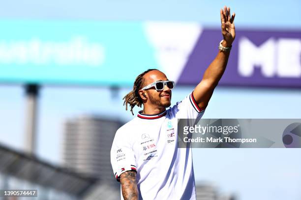 Lewis Hamilton of Great Britain and Mercedes waves to the crowd on the drivers parade ahead of the F1 Grand Prix of Australia at Melbourne Grand Prix...
