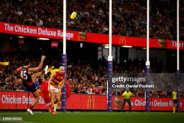 Alec Waterman of the Bombers kicks a goal from the boundary line during the round four AFL match between the Essendon Bombers and the Adelaide Crows...