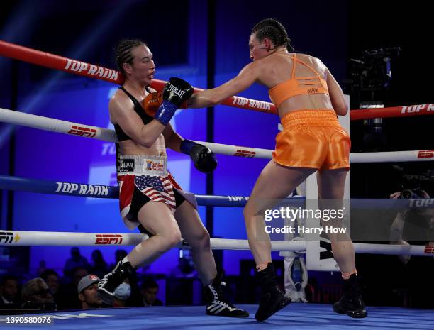 Mikaela Mayer punches Jennifer Han along the ropes on her way to a 10 round unanimous decision to retain the WBO/IBF Jr Lightweight Title at The...