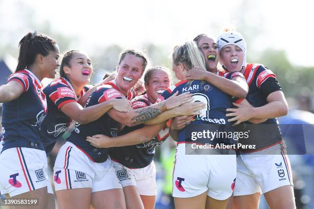 Roosters celebrate a Olivia Higgins try during the NRLW Grand Final match between the St George Illawarra Dragons and the Sydney Roosters at Moreton...