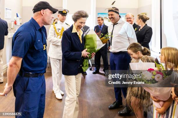 Her Royal Highness Princess Anne, The Princess Royal receives flowers from Ellie McInnes and Ava Ritchie during a visit to the Sea Heritage...