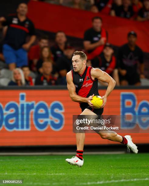 Devon Smith of the Bombers runs in to kick a goal during the round four AFL match between the Essendon Bombers and the Adelaide Crows at Marvel...